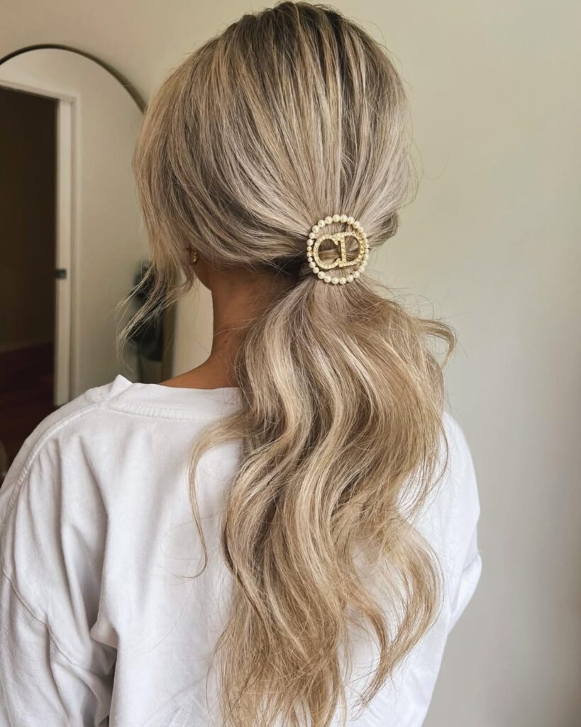 Top 19 Claw Clip Hairstyle Ideas: Trendy and Effortless Looks for Every Occasion 10 Sleek Low Ponytail with Claw Clip
