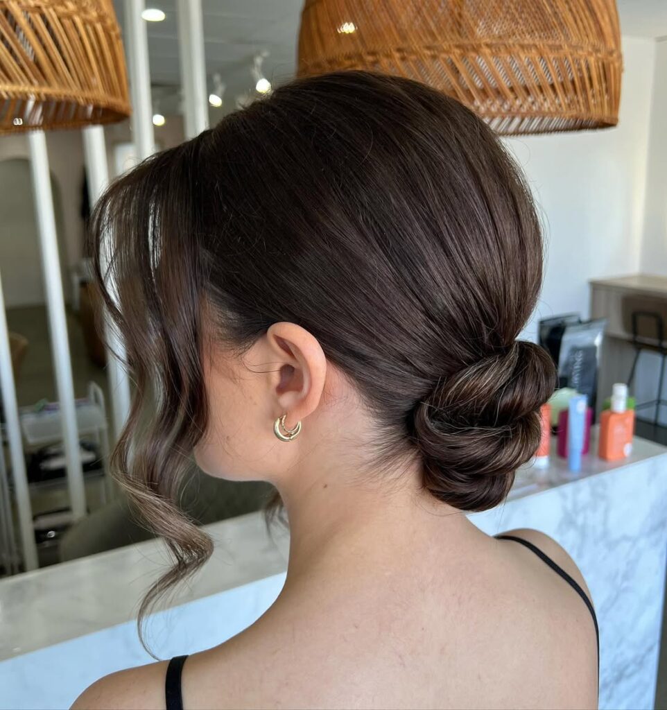 Low Chignon with Face-Framing Layers
