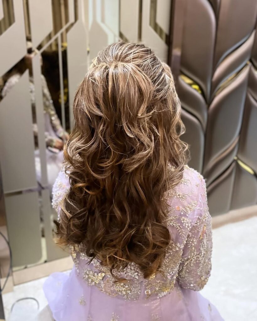 Voluminous Curly Ponytail