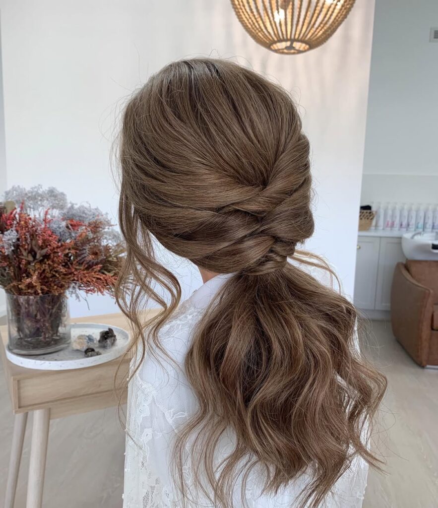 17 Easy Back to School Hairstyles for Girls of All Ages 11 Twisted Ponytail