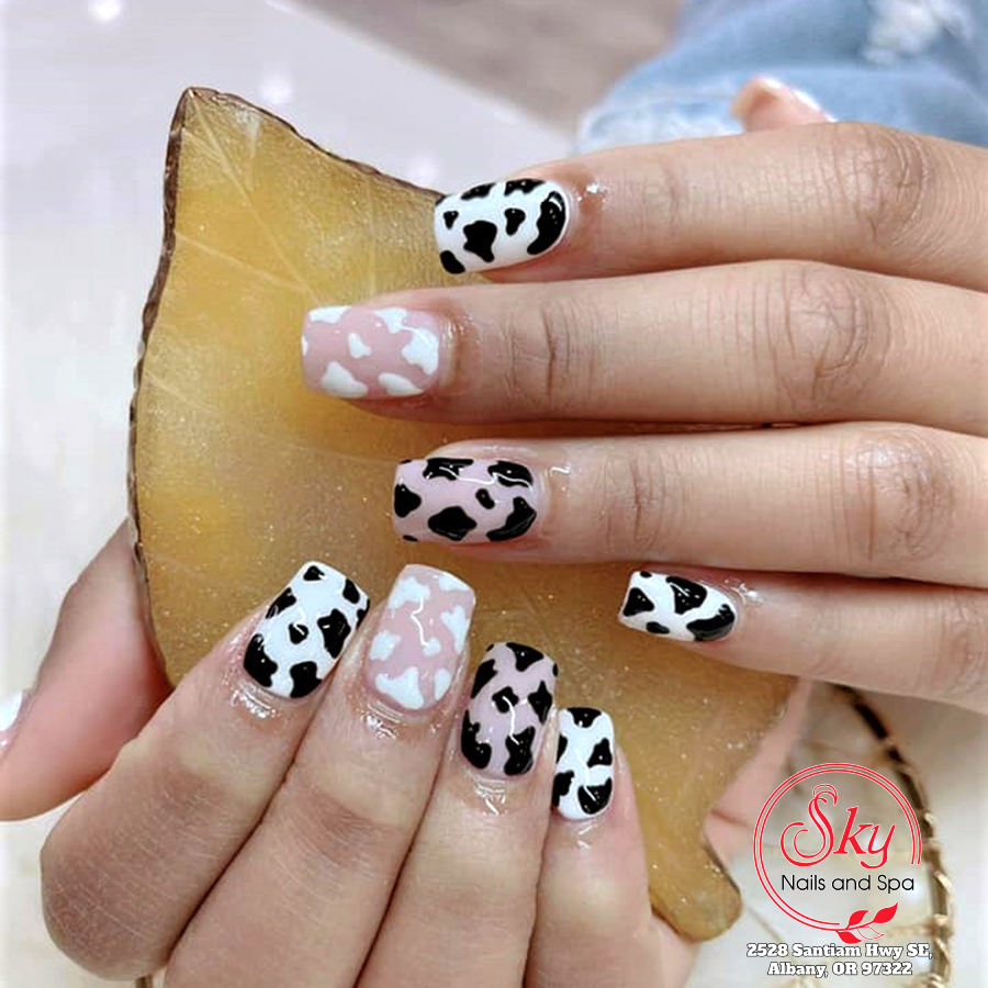 White Cow Print Nails